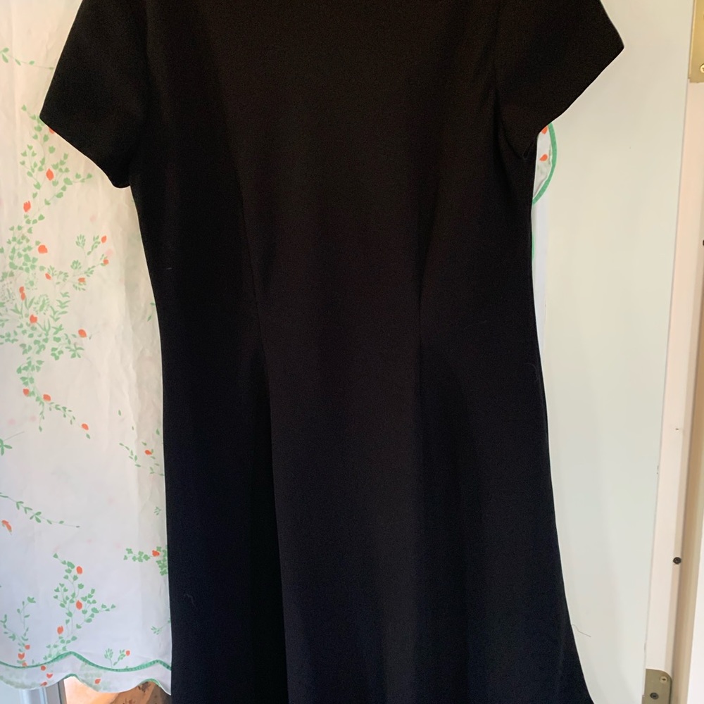 Little black dress with flounced hem. - Picture 4 of 9
